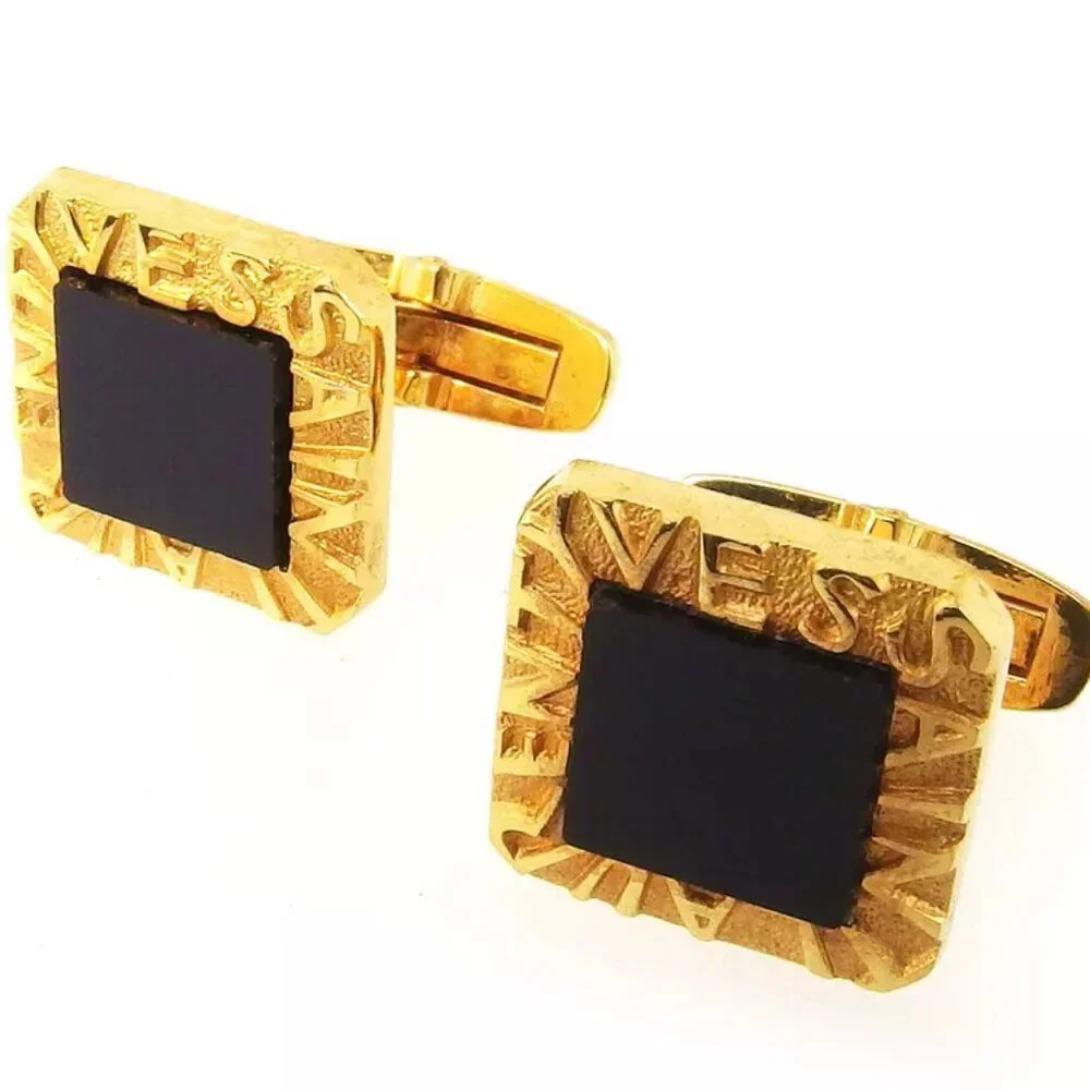 YVES SAINT LAURENT cuffs logo Gold hardware Authentic used T17502